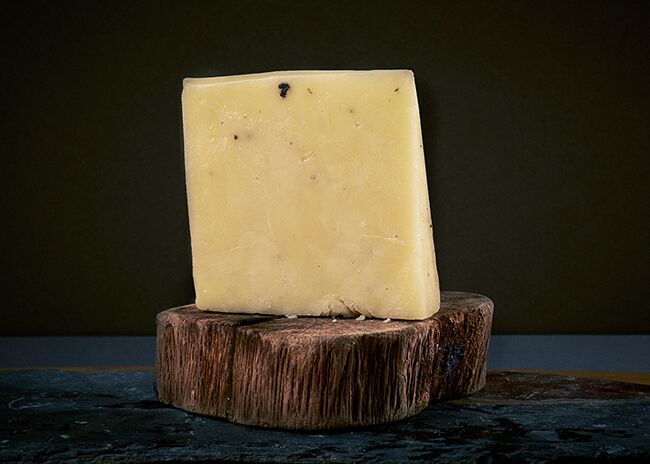 This is a picture of Black Sheep Truffle cheese, featured at Fromagination