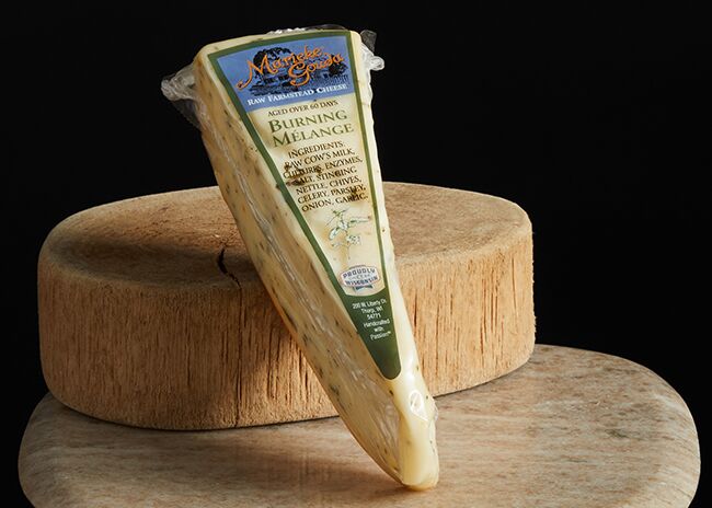 This is a picture of Marieke Burning Melange cheese, featured by Fromagination.