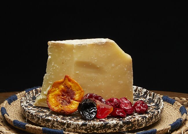 This is a picture of Bleu Mont Dairy's Bandaged Cheddar cheese, offered by Fromagination.