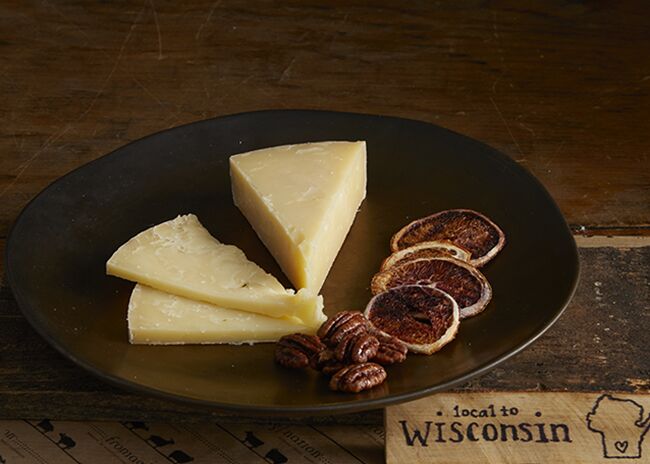 This is a picture of Bleu Mont Bandaged Cheddar cheese, featured by Fromagination.