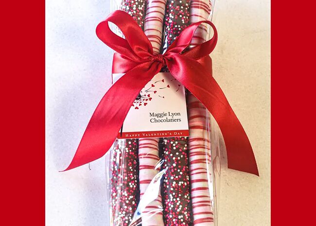 This is a picture of the Valentine Chocolate-Covered Pretzel Rods, offered by Fromagination.