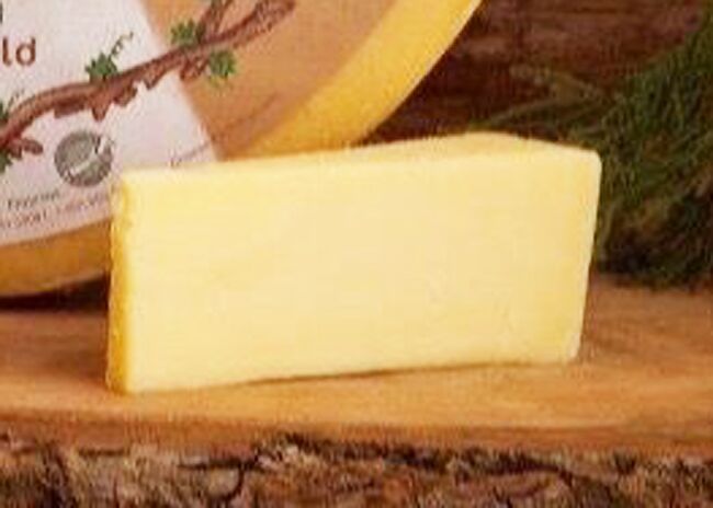 This is a picture of The Stag Cheddar cheese, featured by Fromagination.