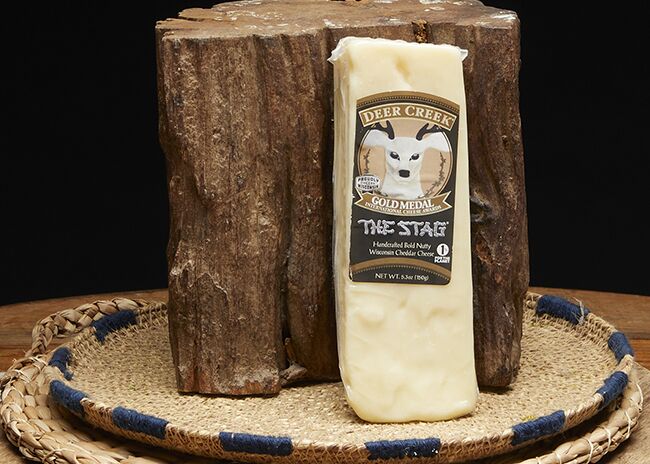 This is a picture of The Stag Cheddar cheese, featured by Fromagination.