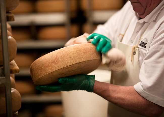 This is a picture of Uplands Cheese's Pleasant Ridge Reserve cheese, offered by Fromagination.