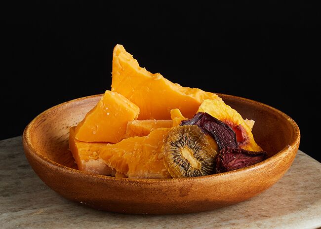 This is a picture of Hook's 15-Year Aged Cheddar cheese, offered by Fromagination.