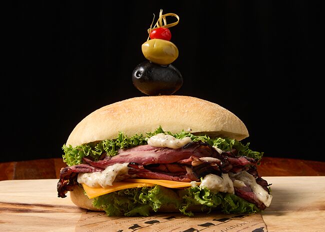 This is a picture of Fromagination's Val D'Aran Beef Sandwich.